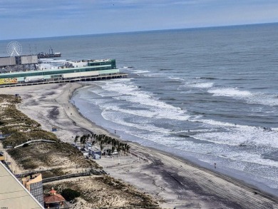 Step into the open-concept living space, where large sliding