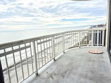 Step into the open-concept living space, where large sliding