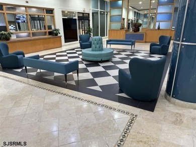 Step into the open-concept living space, where large sliding