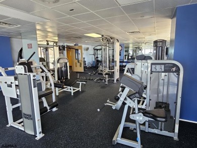 Step into the open-concept living space, where large sliding