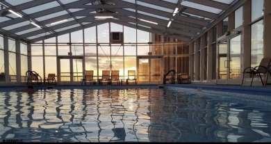 Step into the open-concept living space, where large sliding