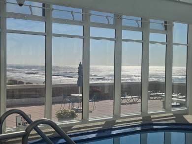 Step into the open-concept living space, where large sliding