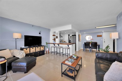 Experience Coral Gables living from this high-floor residence at