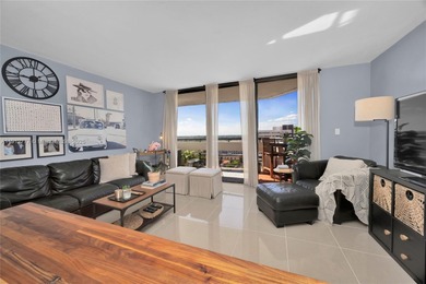 Experience Coral Gables living from this high-floor residence at