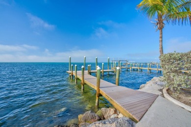 Nestled on a secluded 2-acre lot in Grassy Key, Marathon, this