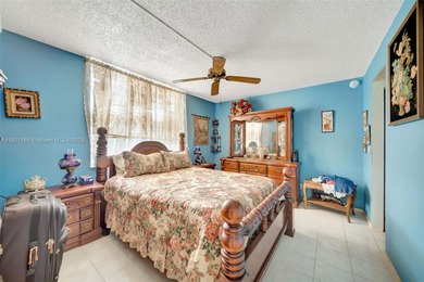 Welcome to this charming 2-bedroom, 2-bathroom condo located on