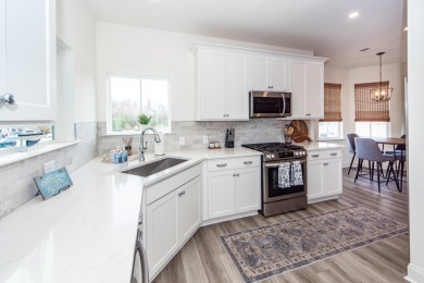 STUNNING, TURN-KEY 3 BEDROOM, 3 BATH SECOND FLOOR CONDO WITH