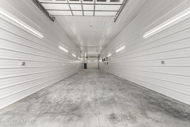 'Double Deluxe Drive-Thru Unit'' measures at 20x100 with garage