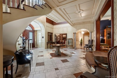 ROSLYN HARBOR; Timeless Brick Manor: Behind iron gates and a