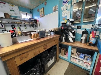 Quaint commercial building on .28 acre lot for sale in a prime