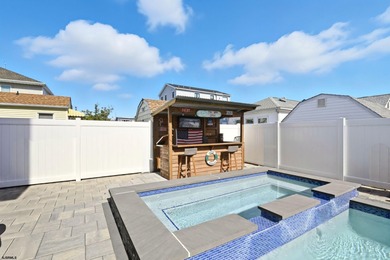 Discover the pinnacle of Coastal Luxury in this stunning Beach