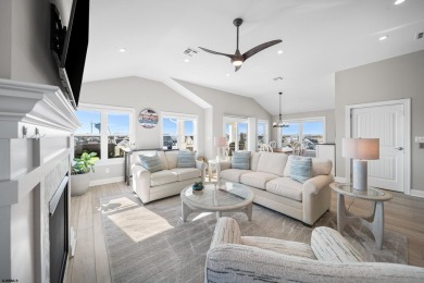 Discover the pinnacle of Coastal Luxury in this stunning Beach