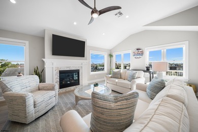 Discover the pinnacle of Coastal Luxury in this stunning Beach