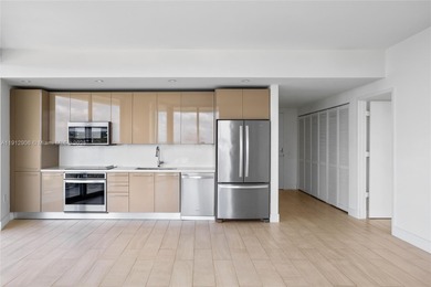 Soaring high on the 25th floor, this sought-after Line 04 unit