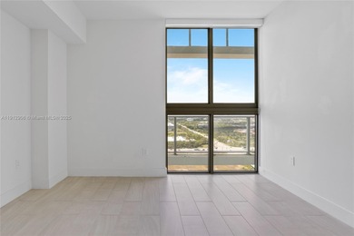 Soaring high on the 25th floor, this sought-after Line 04 unit