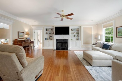 Nestled on a serene 1.88 acre wooded lot, enjoy resort-style