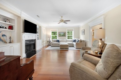 Nestled on a serene 1.88 acre wooded lot, enjoy resort-style