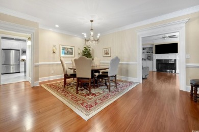 Nestled on a serene 1.88 acre wooded lot, enjoy resort-style