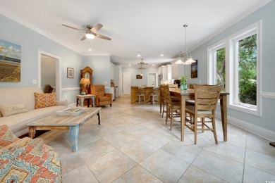 Nestled on a serene 1.88 acre wooded lot, enjoy resort-style