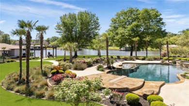 Welcome to the pinnacle of luxury lakefront living on nearly 2