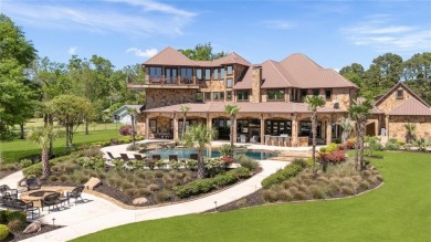 Welcome to the pinnacle of luxury lakefront living on nearly 2