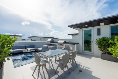 Completed in 2022, this 4-level townhome in