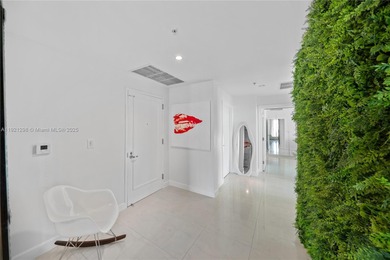 CORNER PENTHOUSE WITH DIRECT BAYFRONT AND SUNSET VIEWS AT