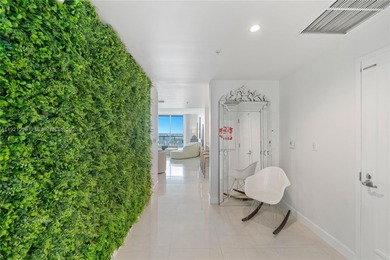 CORNER PENTHOUSE WITH DIRECT BAYFRONT AND SUNSET VIEWS AT