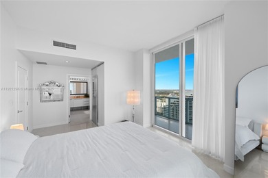 CORNER PENTHOUSE WITH DIRECT BAYFRONT AND SUNSET VIEWS AT