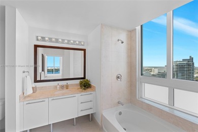 CORNER PENTHOUSE WITH DIRECT BAYFRONT AND SUNSET VIEWS AT