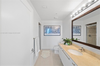 CORNER PENTHOUSE WITH DIRECT BAYFRONT AND SUNSET VIEWS AT