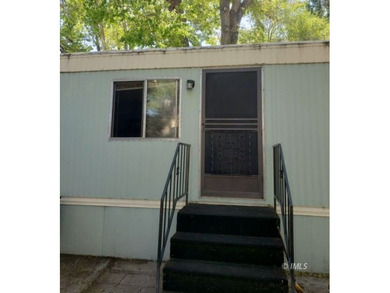 A cozy 2 bedroom, 1 bath home perfectly situated near the canal