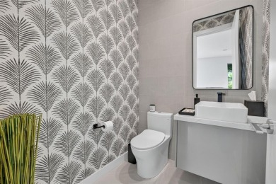 Literally across from the beach! Located in highly desirable