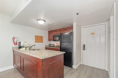 This fully furnished 2-bedroom, 2-bathroom, first-floor end unit