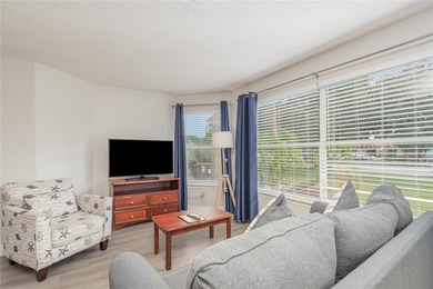 This fully furnished 2-bedroom, 2-bathroom, first-floor end unit