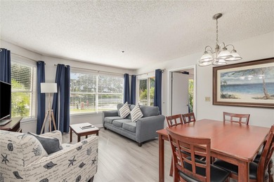 This fully furnished 2-bedroom, 2-bathroom, first-floor end unit