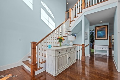 This exceptional 5+ bedroom coastal retreat in the sought-after