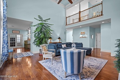 This exceptional 5+ bedroom coastal retreat in the sought-after