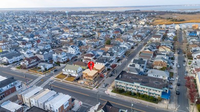 Just two blocks from the beach, this brand-new luxury