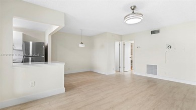 Remodeled 1-Bedroom Condo with Pool and Garden Views

