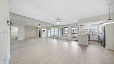 Remodeled 1-Bedroom Condo with Pool and Garden Views

