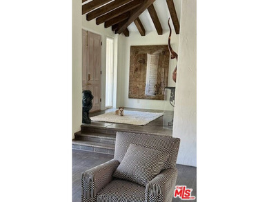 Located in the prestigious gated community of Bella Monte this