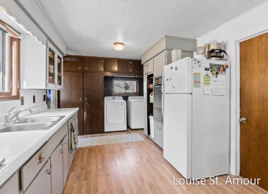 Main floor living with 3 bedrooms and a big backyard! Garage and