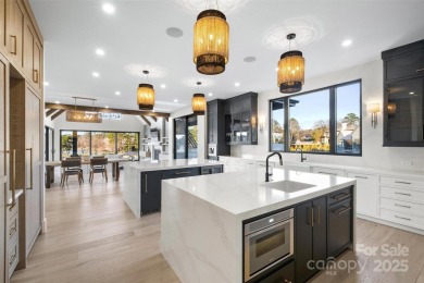 Experience the pinnacle of Lake Norman living from this