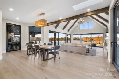 Experience the pinnacle of Lake Norman living from this