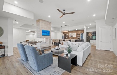 Experience the pinnacle of Lake Norman living from this