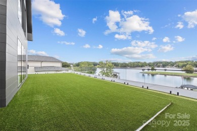 Experience the pinnacle of Lake Norman living from this