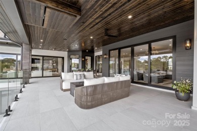 Experience the pinnacle of Lake Norman living from this