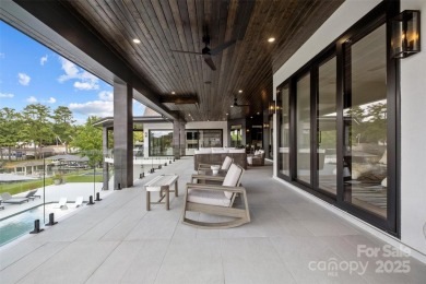 Experience the pinnacle of Lake Norman living from this