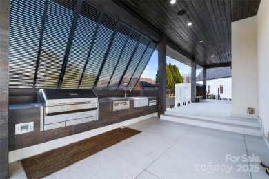 Experience the pinnacle of Lake Norman living from this